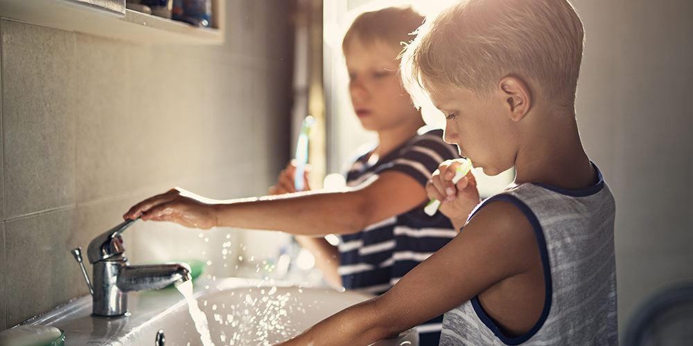 Kids brushing teeth